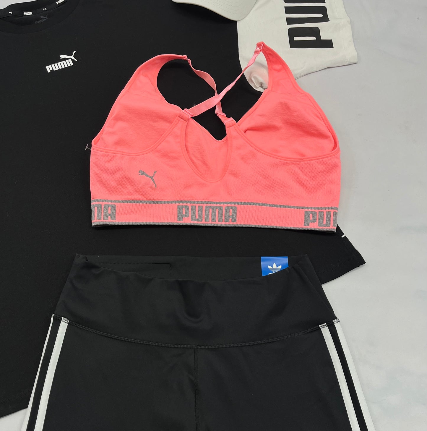 😍 Top sport : PUMA corail XL/ femme état neuf ! Pas porté . Bretelles ajustable et pad.amovible .