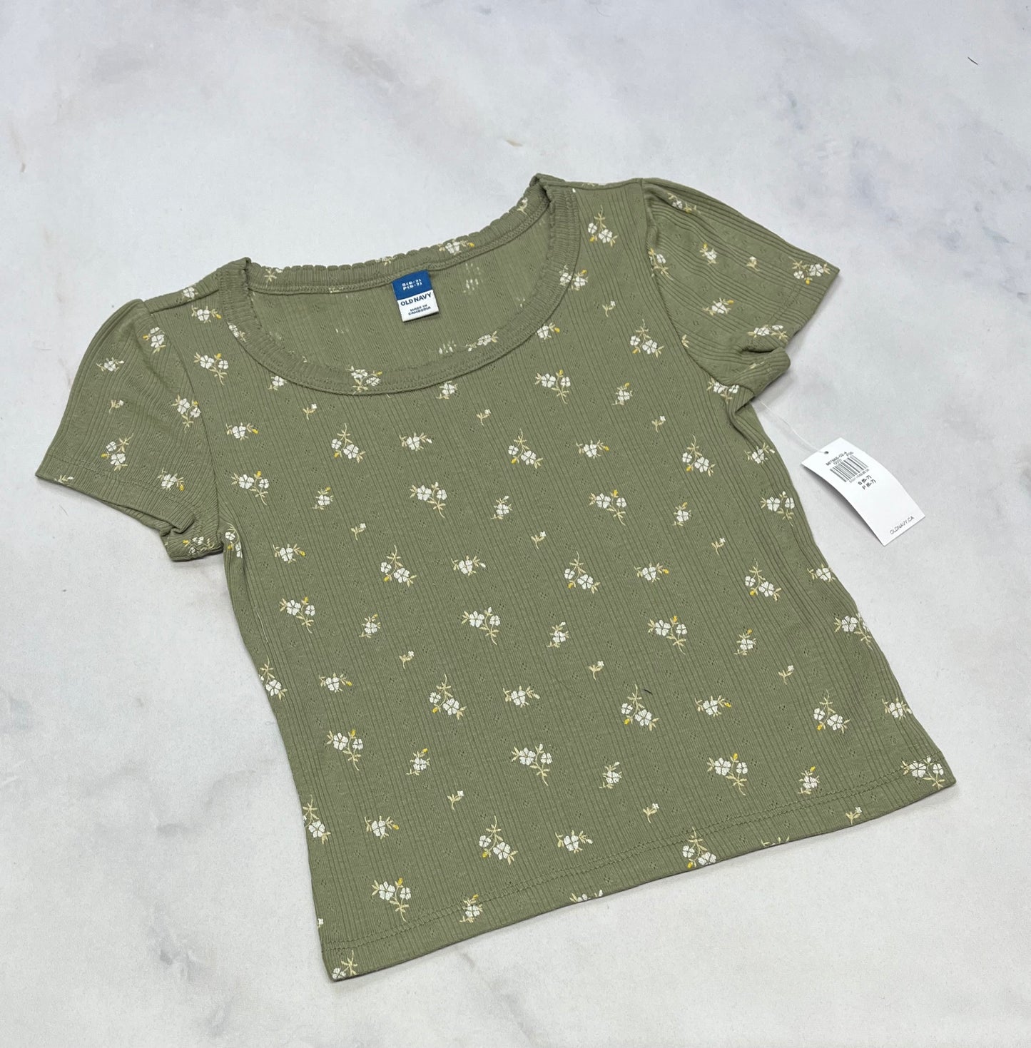 Manche courte : fleurit fait 5-6 ans écourté neuf !