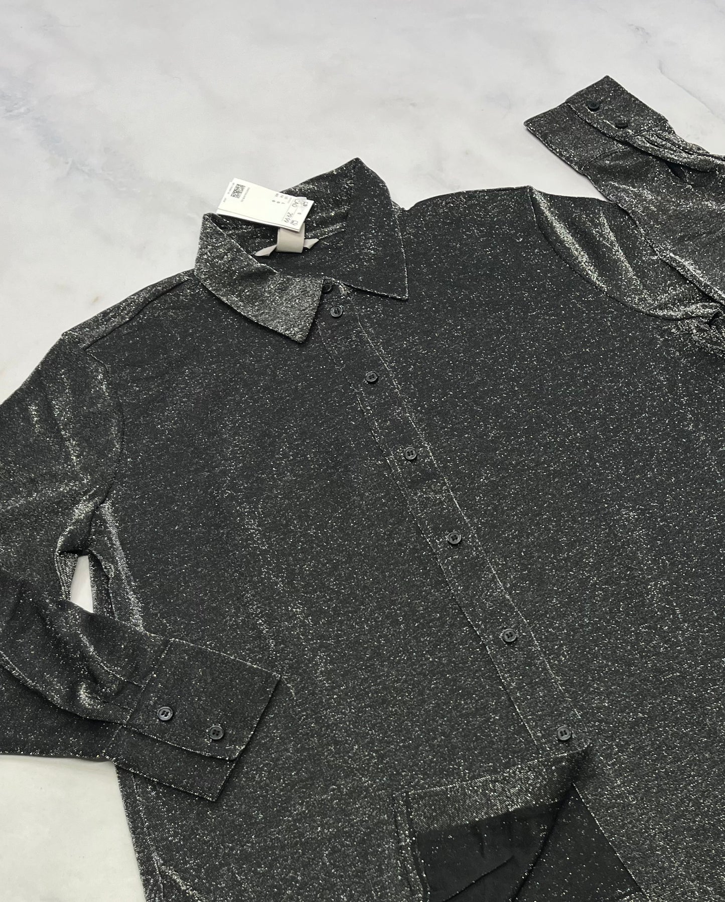 Chemisier argenté : M/ femme L/ femme coupe confo : pique pas stretch de partout . Molle et neuve !