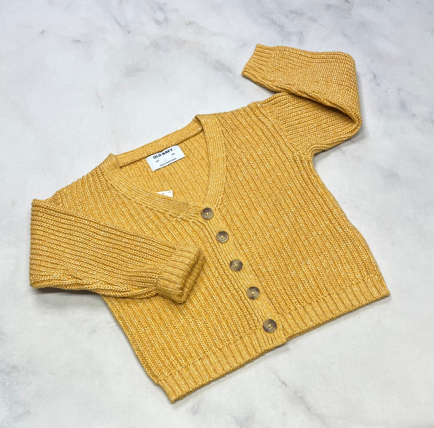 Tricot : Veste neuve ! 5 ans .