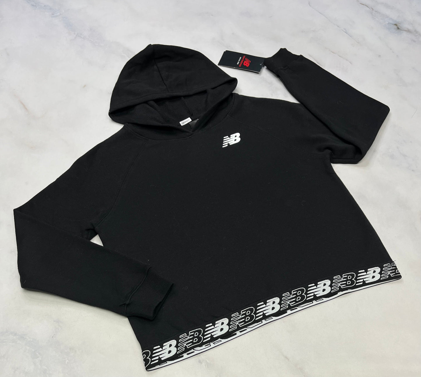 New Balance : Fille /Cagoule en ouaté neuve !