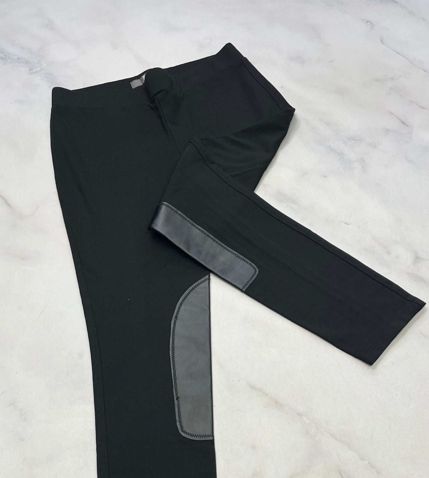 Tristan : Skinny jegging noir effet patch cuirette . Mou confo M/ fit ( 6-7 ans ) comme neuf.