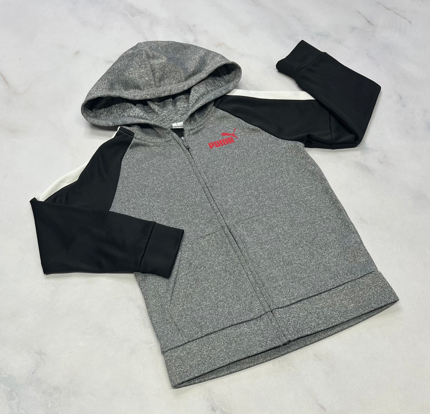 Puma : Veste zip sport int. en polar 5 ans comme neuve .