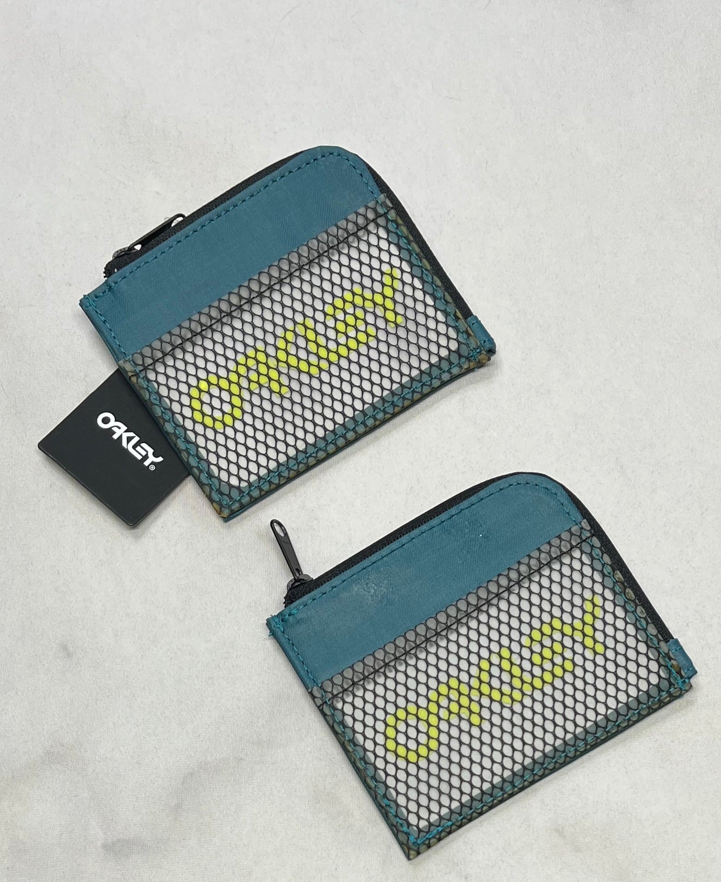 OAKLEY: petit porte carte et monnaie neuf !