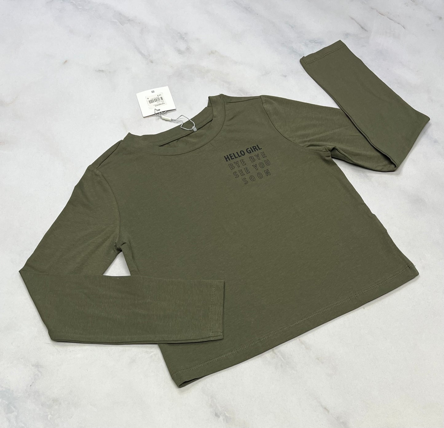 Manche longue : Tag kaki mi-hanches neuf! ( fait 7 ans )