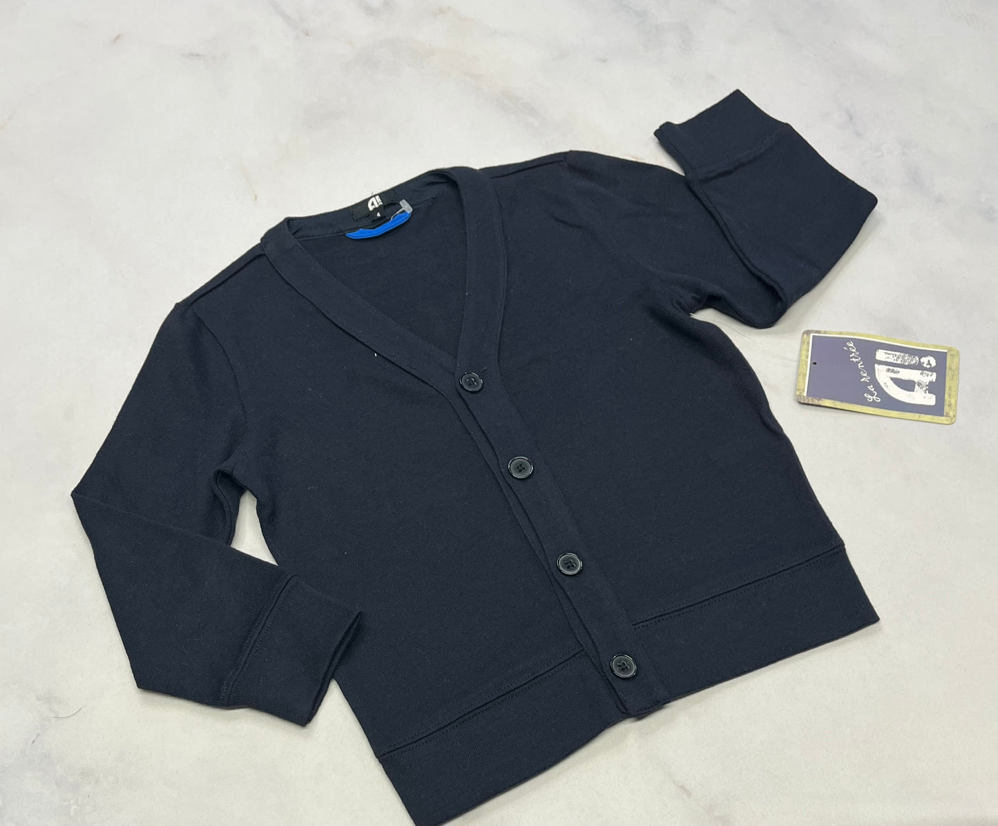 Veste : Marine 4 ans neuve .