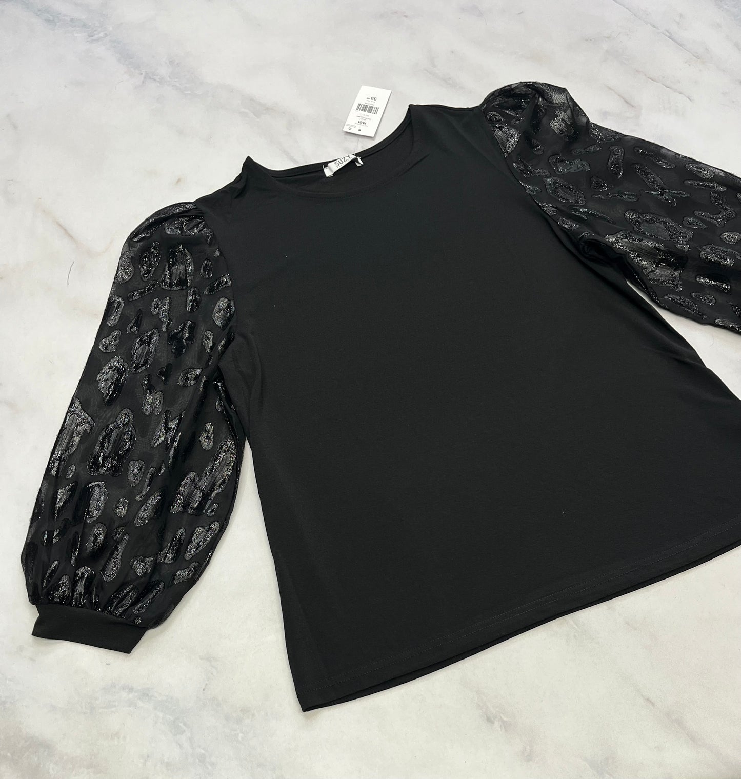 Suzie : Manche ballon qui laisse entrevoir . Manches avec détails en velour brillant. Superbe . Devant noir opaque extensible . M/ fit stretch femme neuf !