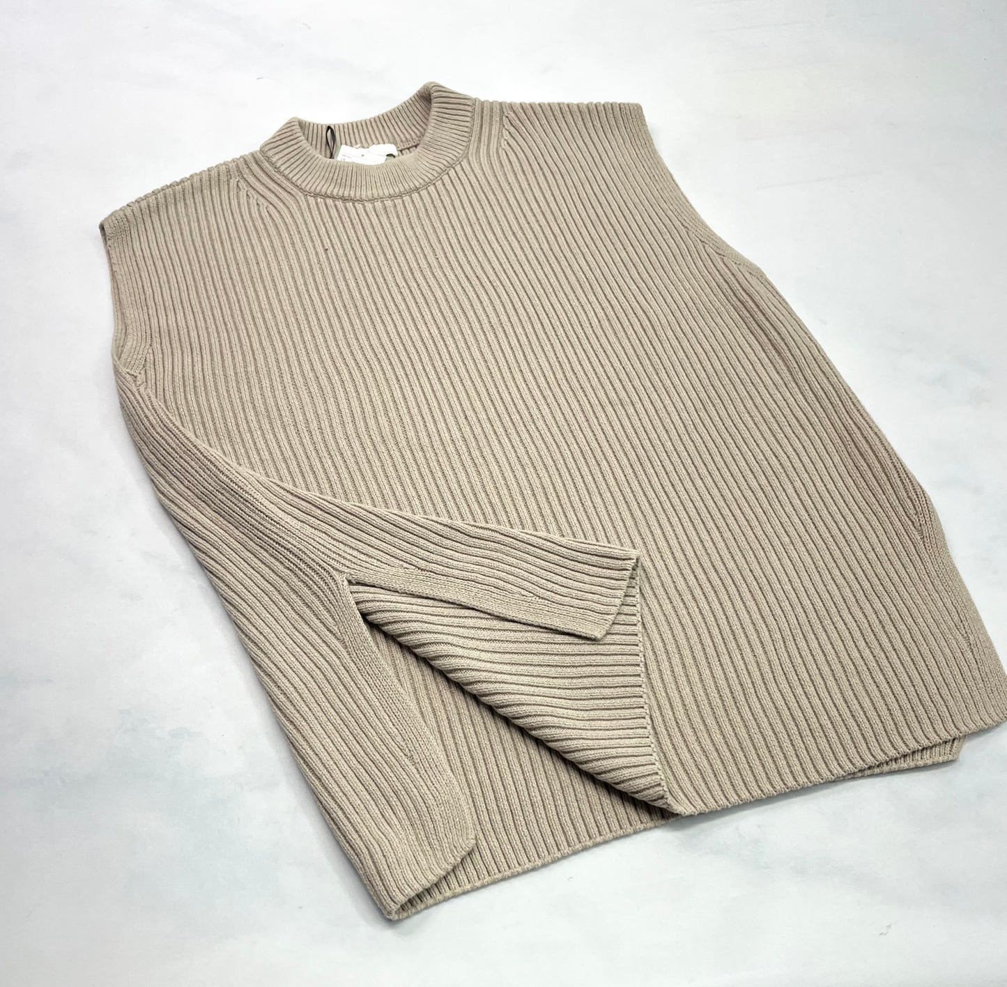 Débardeur long : Longueur tunique en tricot épais stretch de partout . Fendu de chaque côtés . Neuf !M/ femme ample .