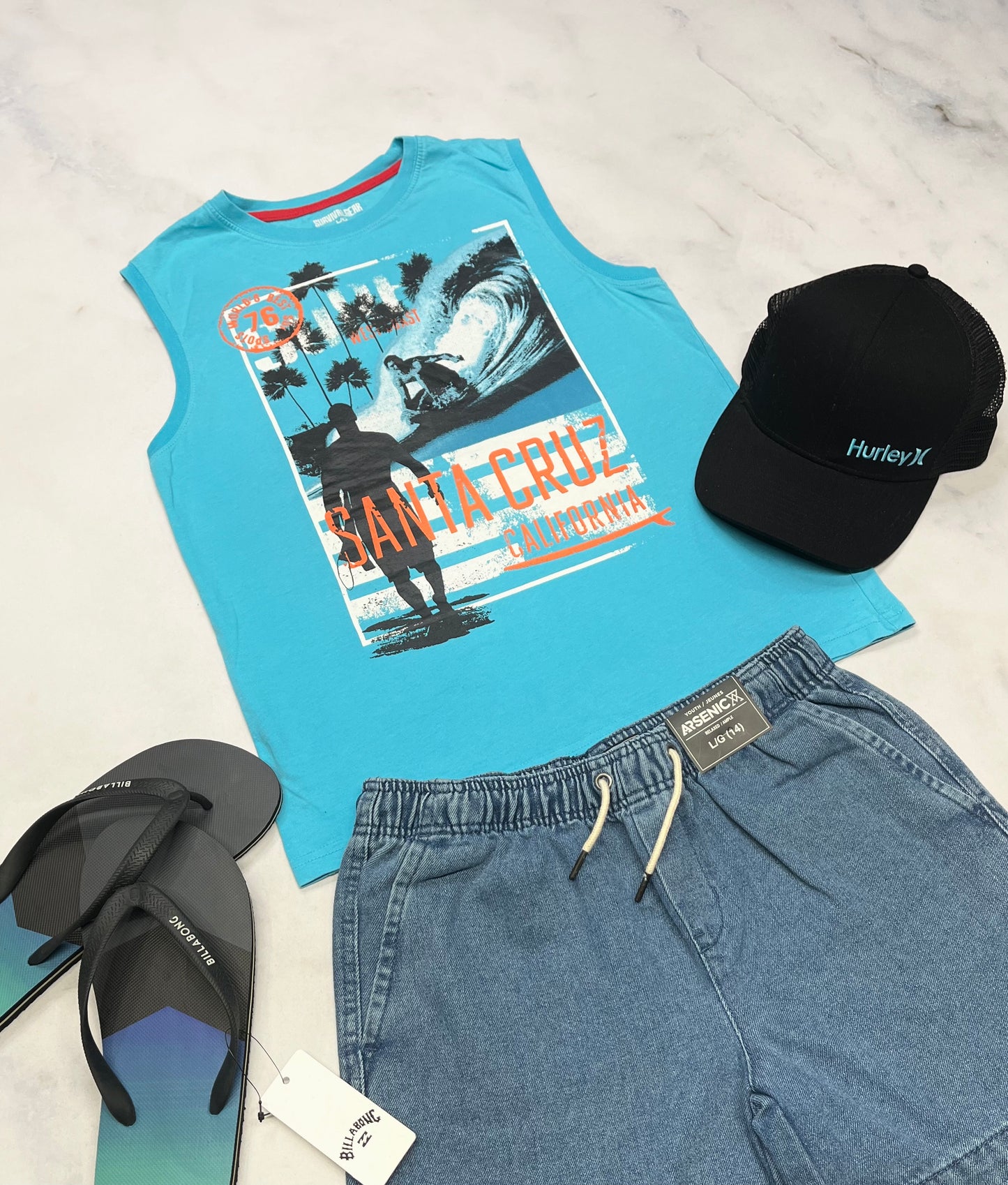🩵 Camisole : 14 ans surf garçon comme neuve  .