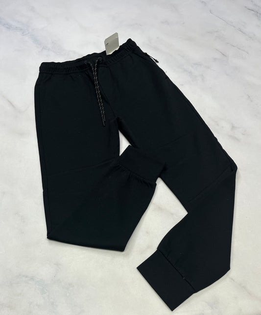 Jog: West noir / zip aux poches et dos . Neuf ! 7-8 ans dispo garçon .