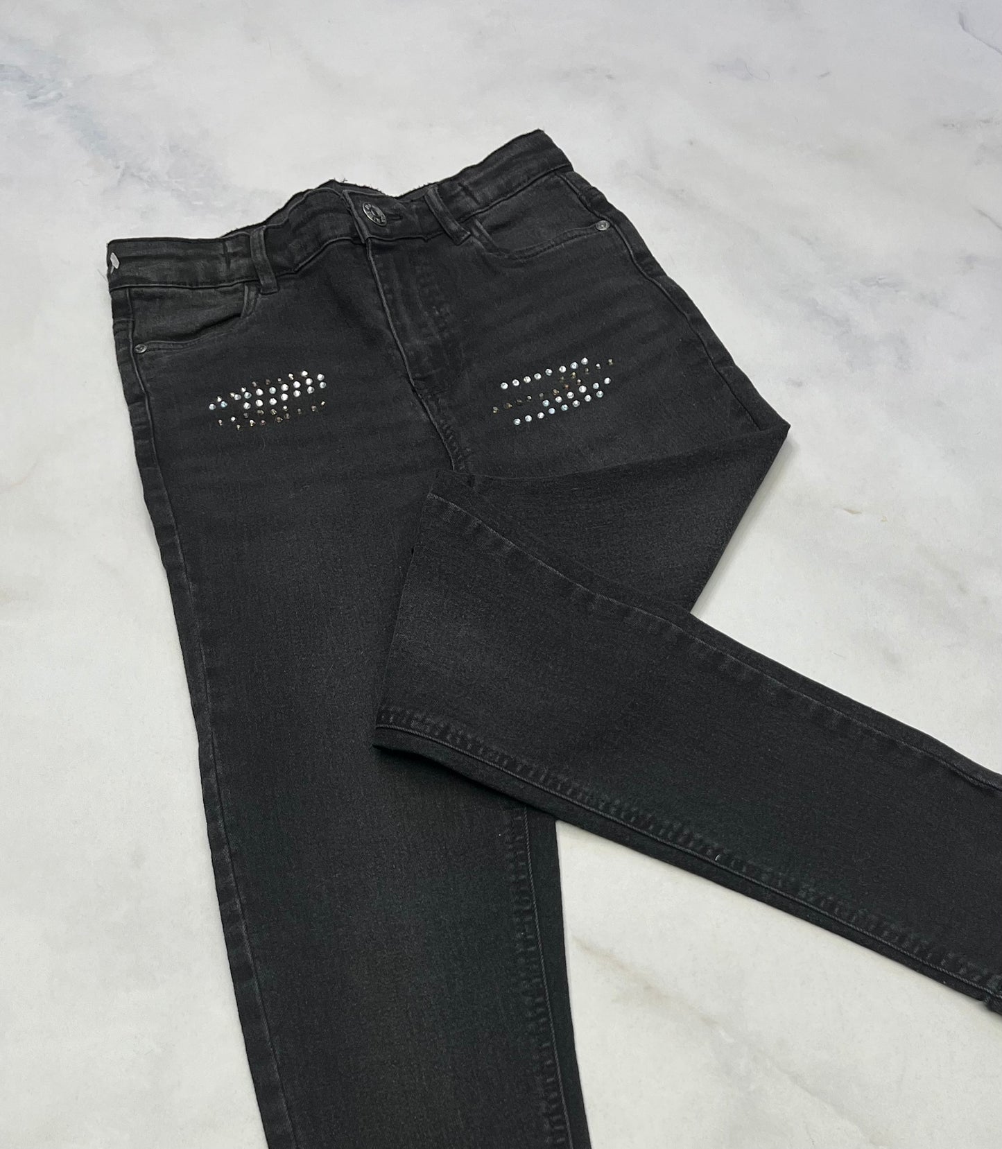 Skinny jeans : mou taille haute effet brillant ou les ligne en haut . Ajustable comme neuve . Stretch . 14 ans ( peu faire 14-16 fait long)