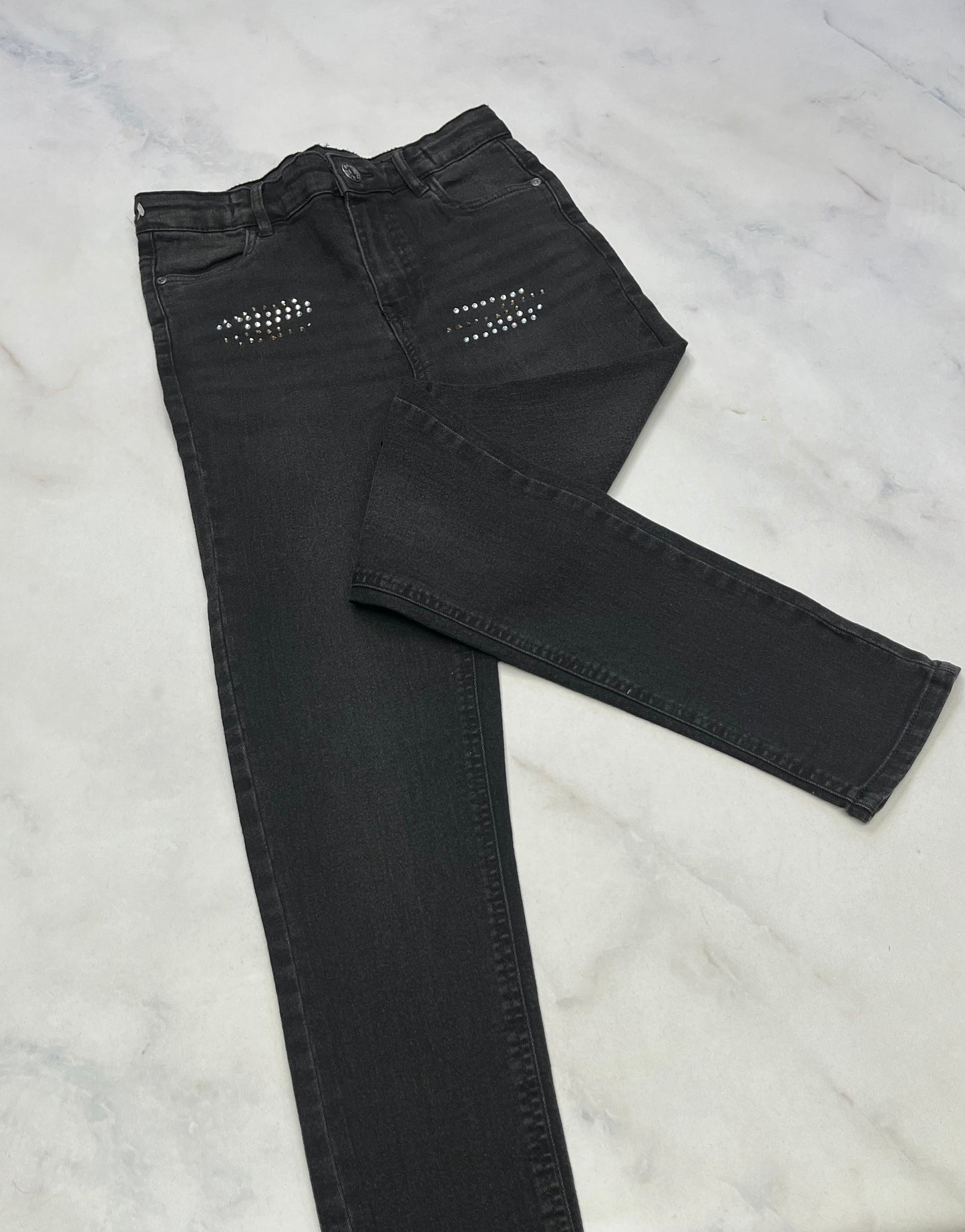 Skinny jeans : mou taille haute effet brillant ou les ligne en haut . Ajustable comme neuve . Stretch . 14 ans ( peu faire 14-16 fait long)