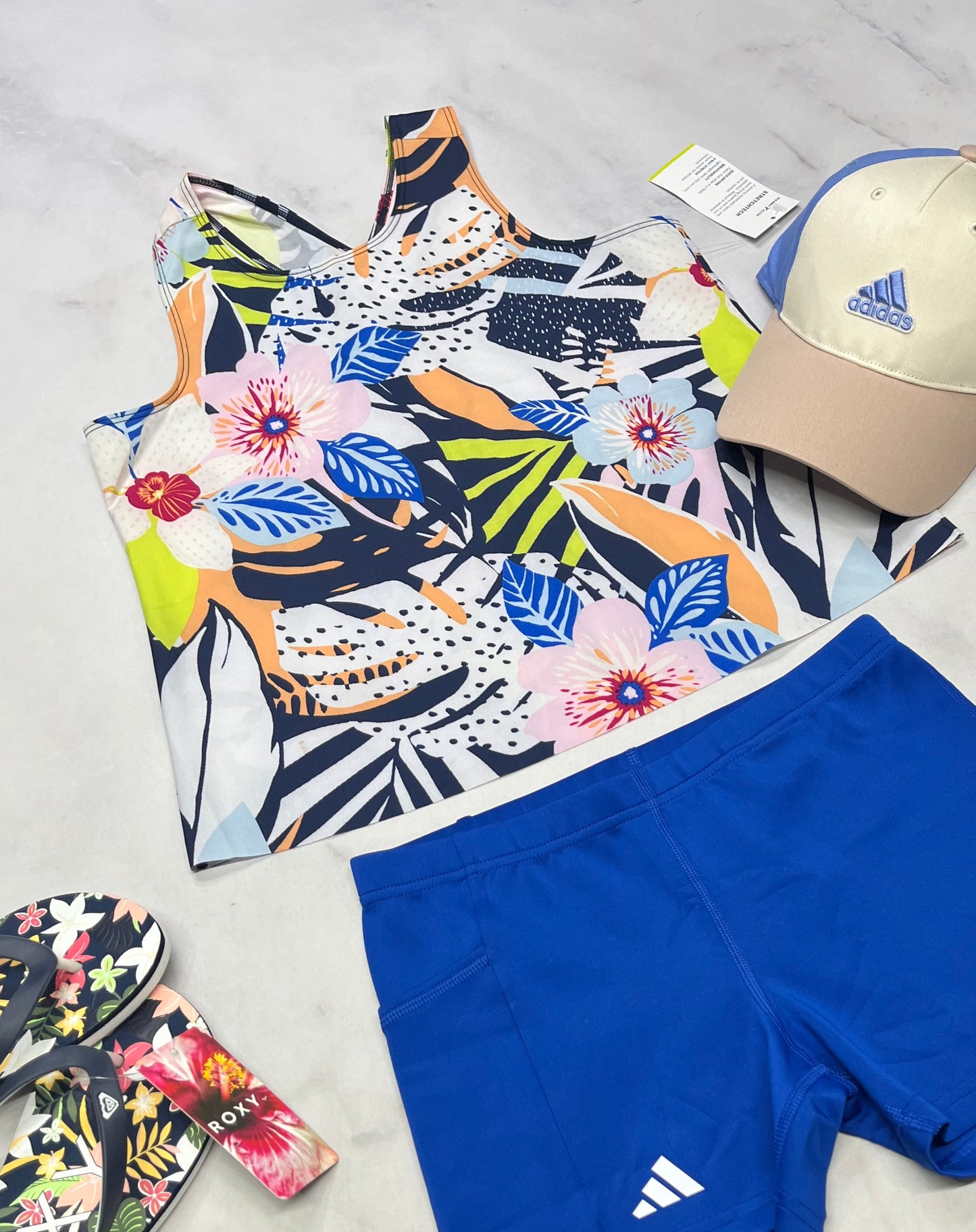 🌴Cami : fleurie en tissu de sport léger look écourté ,stretch 10 -12 ans fille neuf !