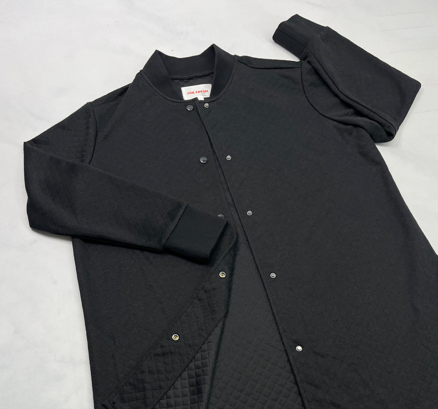 Veste : à snap en bas des fesses incroyable . L/ femme neuve . Tissu texturé.