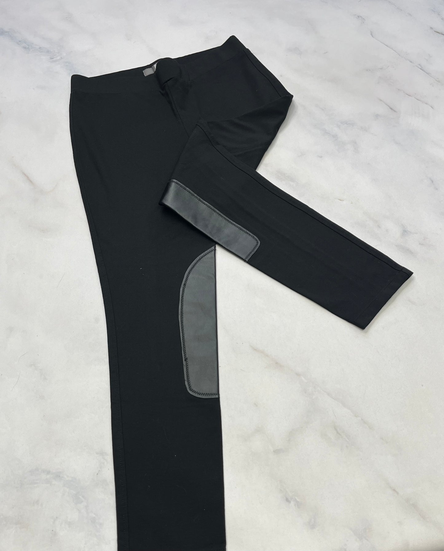 Tristan : Skinny jegging noir effet patch cuirette . Mou confo M/ fit ( 6-7 ans ) comme neuf.