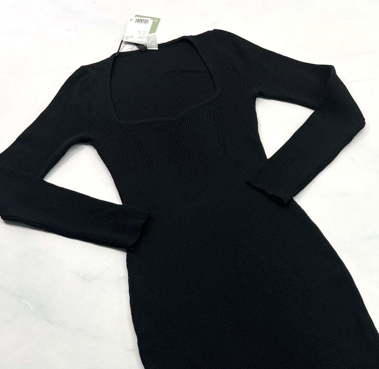 Robe : en tricot noir fait XS/ fit stretch confo neuve .