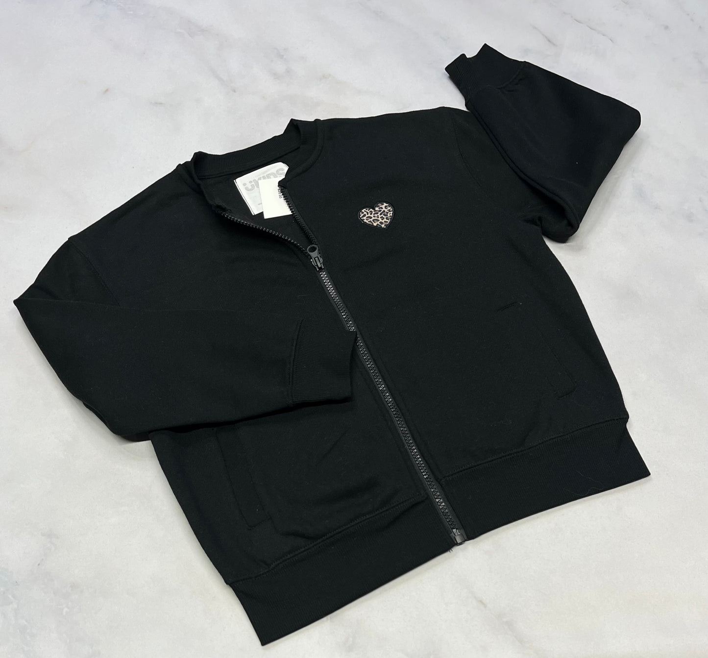 Veste zip : En ouaté noir 7-8 ans neuve .