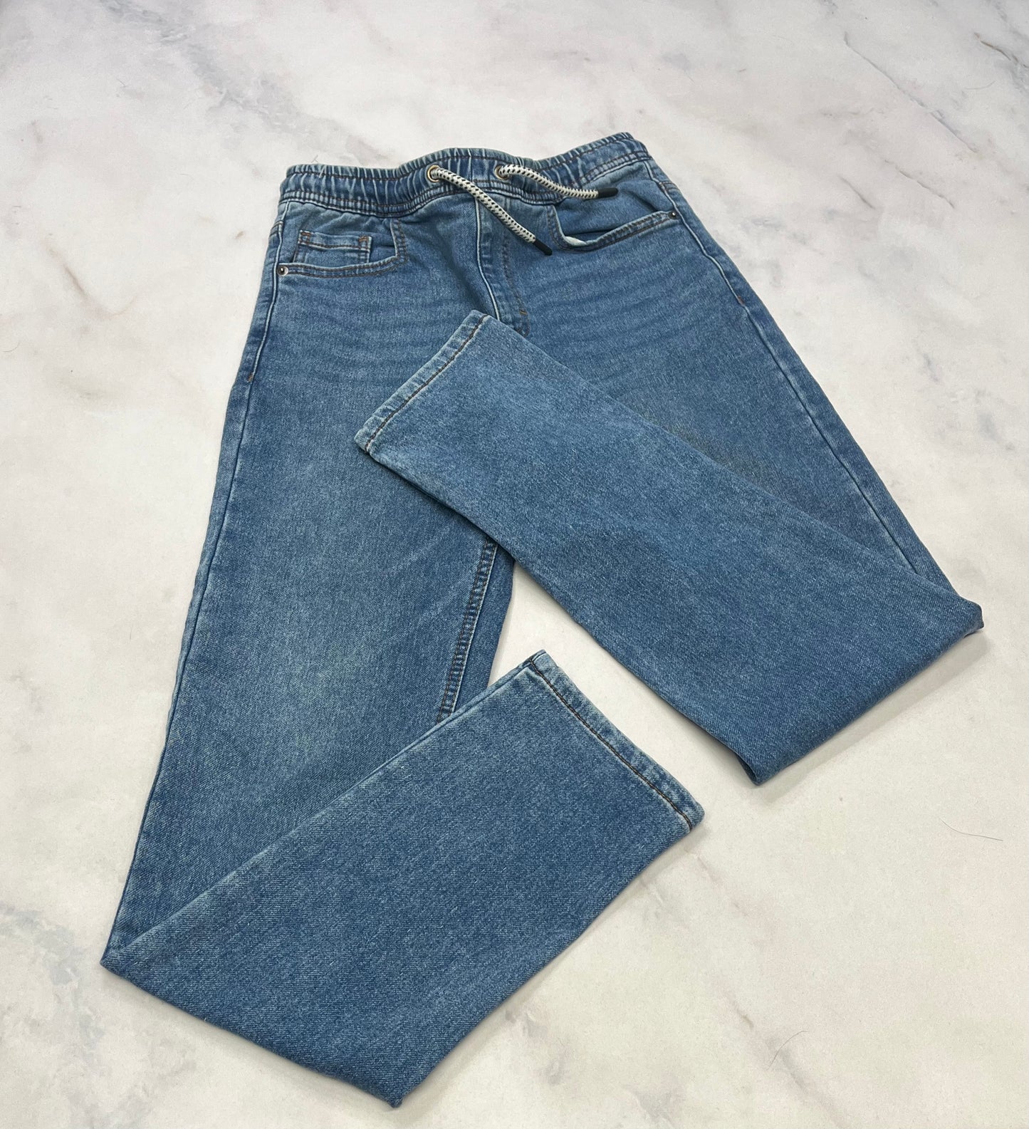 Jeans mou : Surface 16 ans