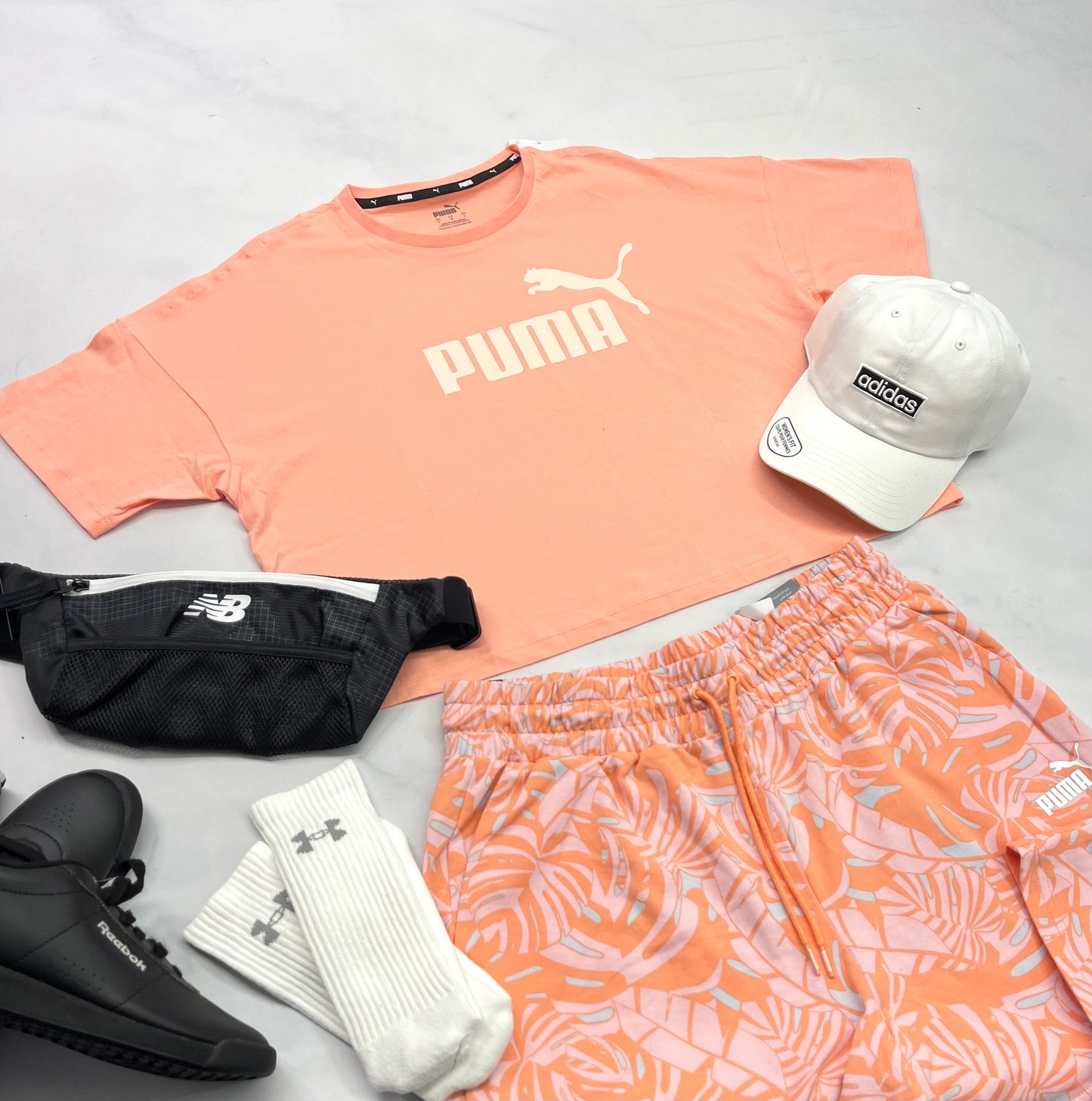 🌴 Manche courte : Puma L/ femme relax fit tendance. Mi hanche look tendance neuf !