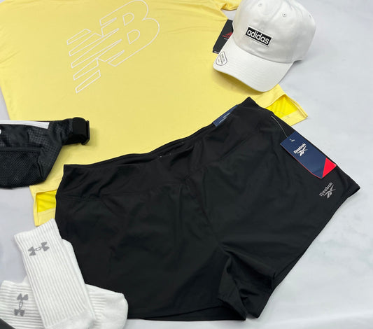 ☀️ Short : REEBOK en tissu de sport souple avec sous culotte stretch intégré. XL(fait + L/ femme 12-13 ans)