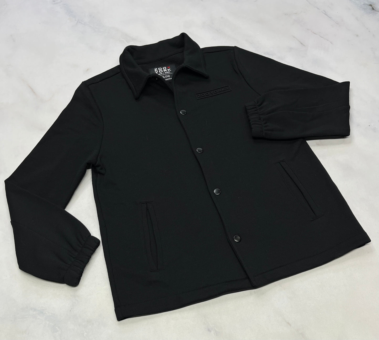 Zoo York : chemise en ouaté incroyable . Logo ton sur ton au haut + bouton pression . 14 ans neuve.