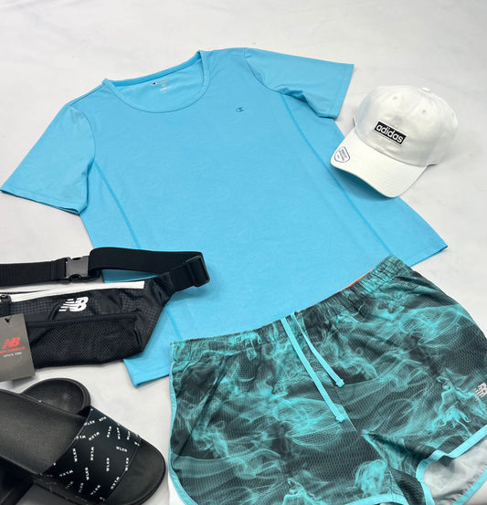 🩵 Manche courte : Champion en tissu de sport extensible ( motifs ton sur ton ) . L/ femme coupe relax  comme neuf!