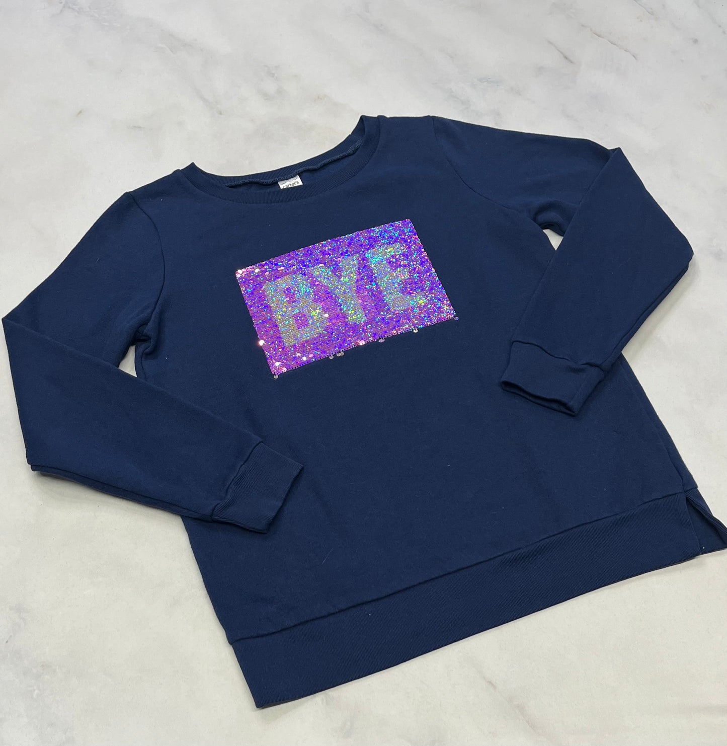 Ouaté : Paillettes réversible BYE/ HI fait 11-12 ans Carter’s confo . Super état .