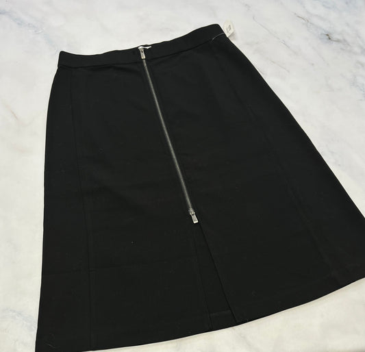 Jupe Penn: tissu automnale 18ans ( XXL/ femme ) longueur 3/4 le zip de dézip de bas en haut aussi . Neuve .