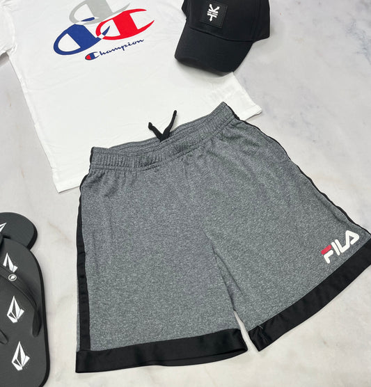 🛹 Bermuda : Fila en tissu de sport 7-8 ans comme neuf !
