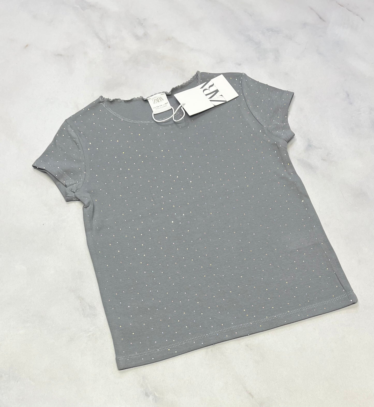 Haut gris ZARA : Brillant au devant stretch fait 7-8 ans neuf!