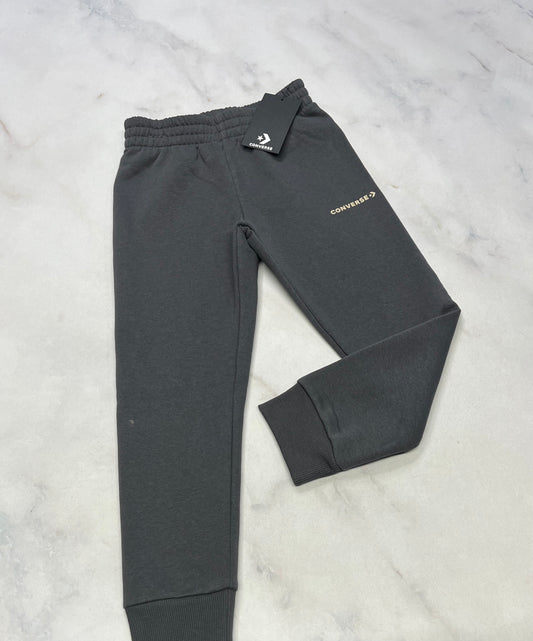 SOLDE ! Converse : Jogger gris unisexe neuf mais 1 taches pâle au bas de la jambe . ( voir photo ) . Très léger .