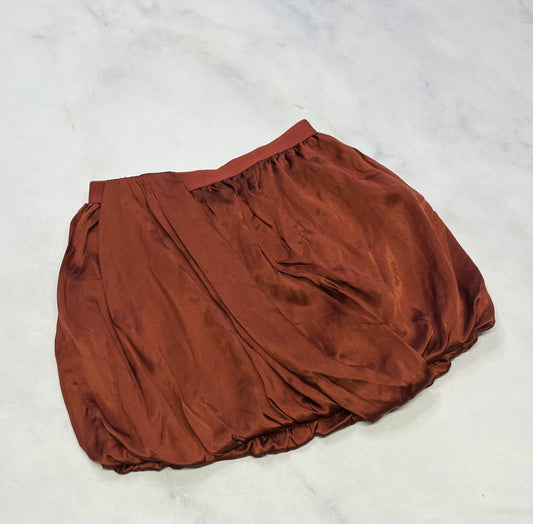 Jupe : look satiné + 10 ans comme neuve .