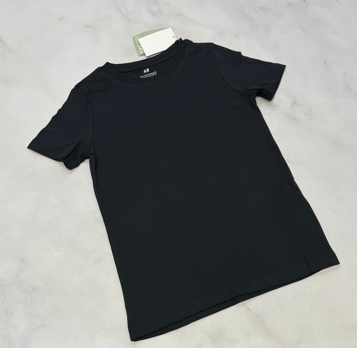 Manche courte noir : basic fait 7-8 ans neuf!