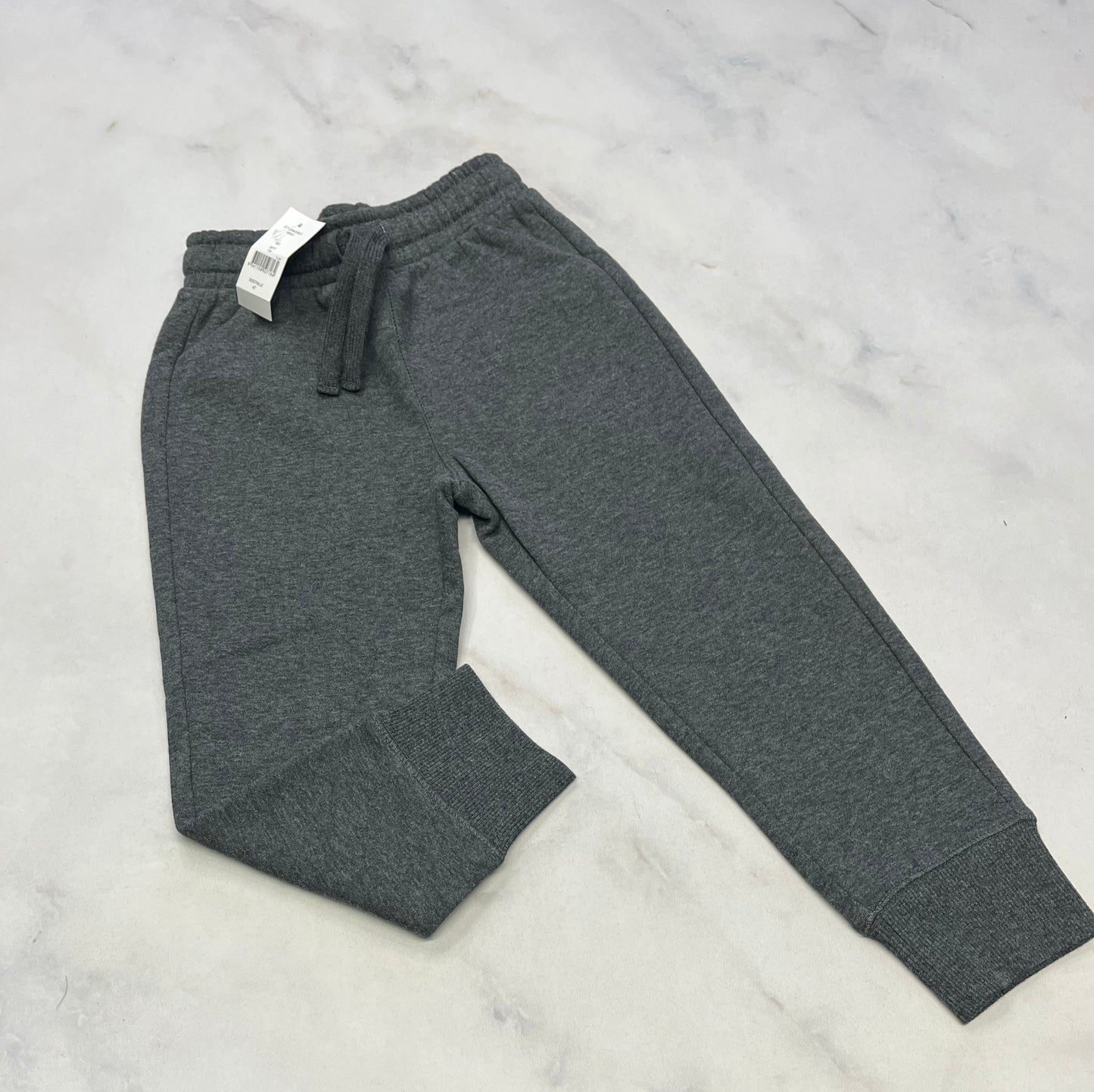 Jogger: gris chaud / doux 4 ans neuve .