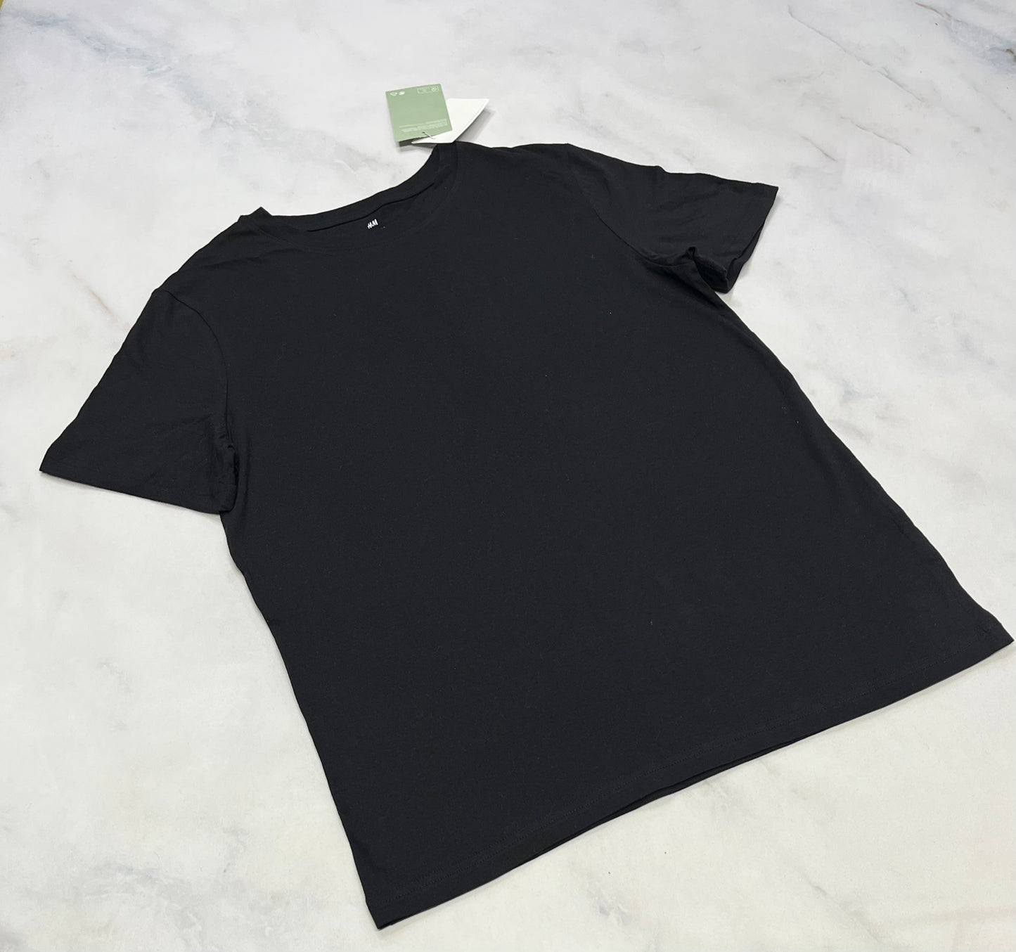 Manche courte : Noir uni 14 ans neuf !