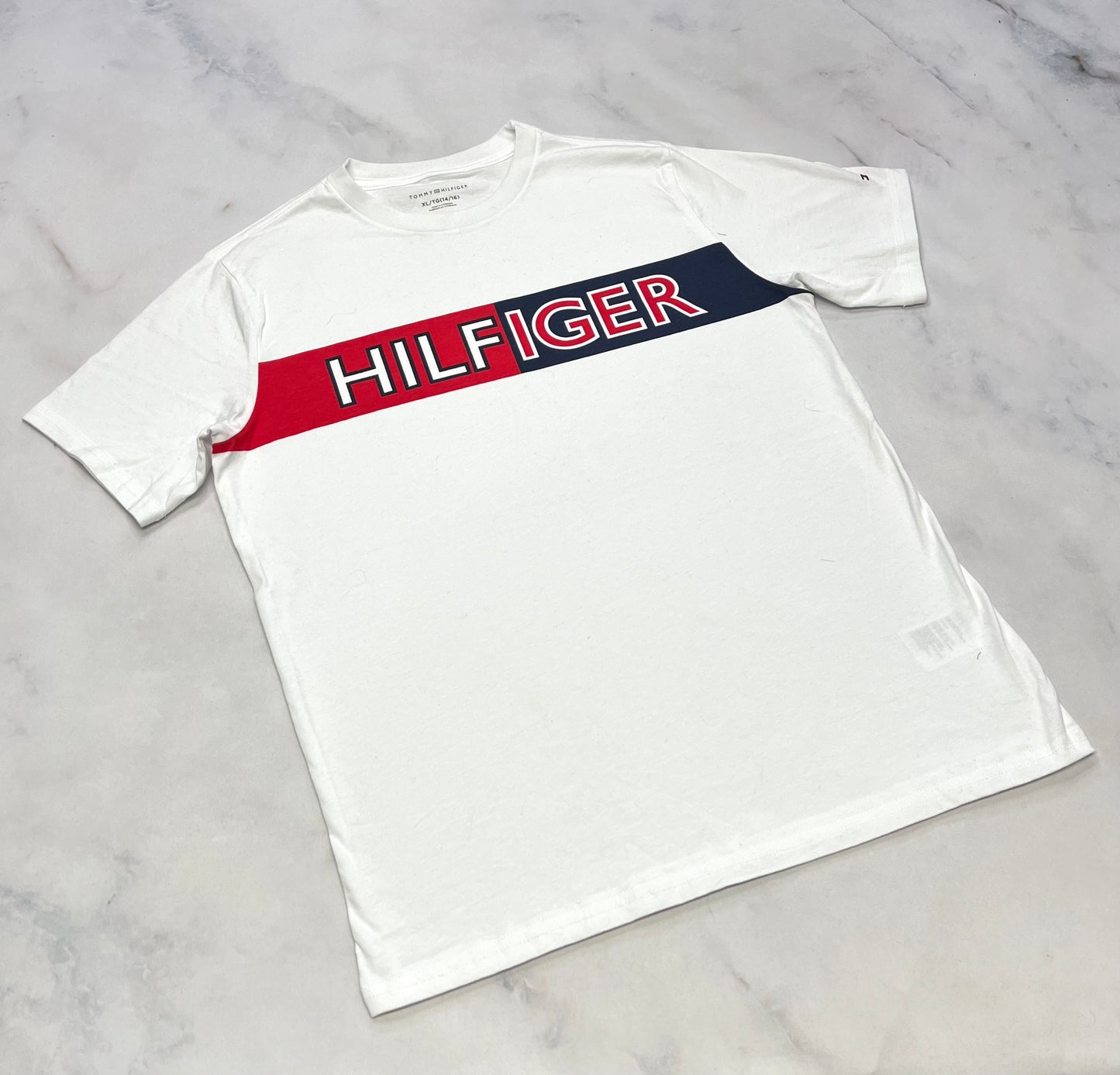 Tommy : Manche courte neuf ! 10-12 et 14-16 ans .