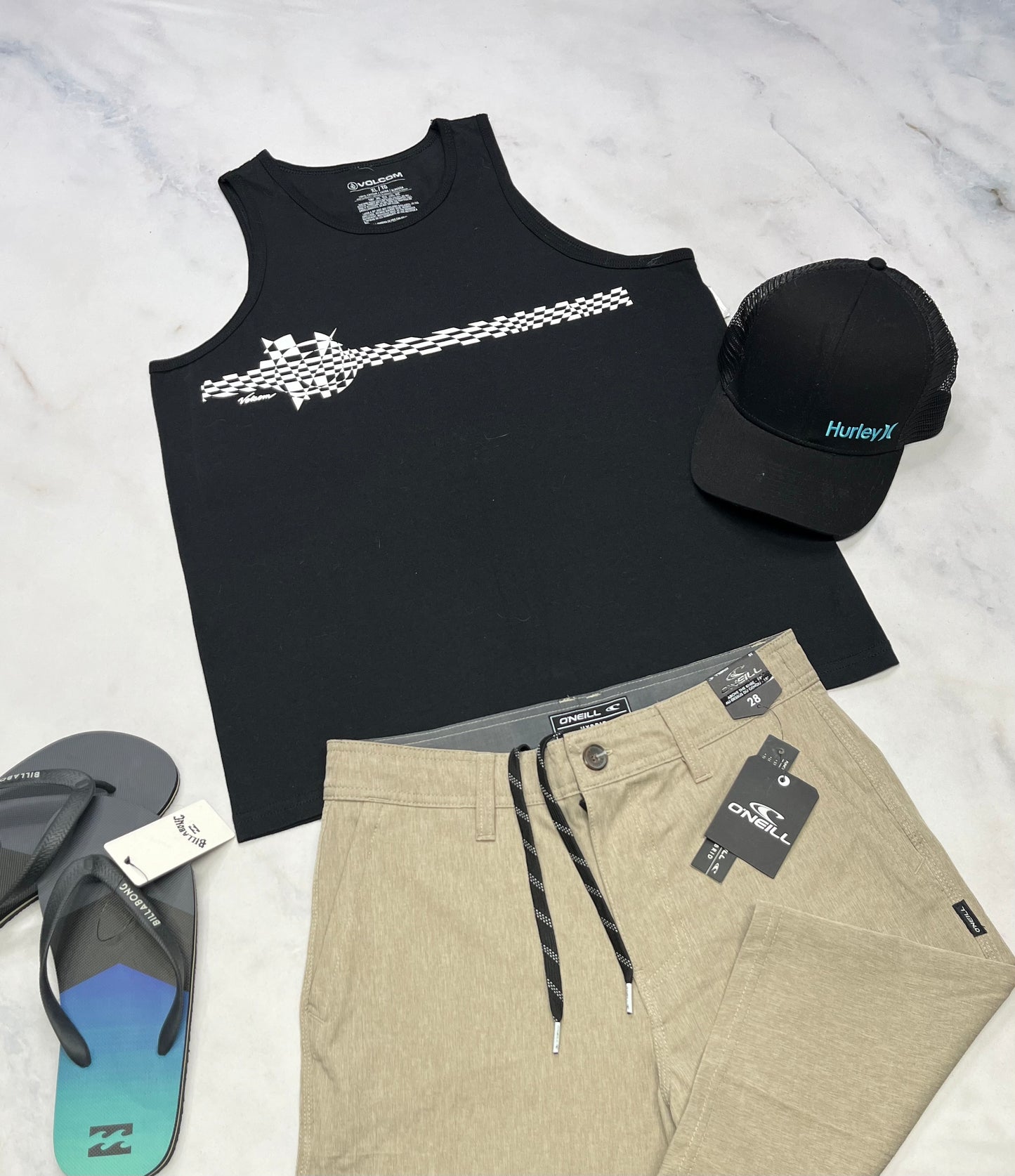🌴 Camisole : Volcom 16 ans garçon neuve . Logo au devant inscrit Volcom .
