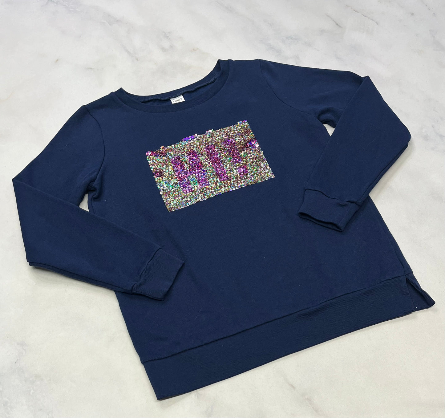 Ouaté : Paillettes réversible BYE/ HI fait 11-12 ans Carter’s confo . Super état .