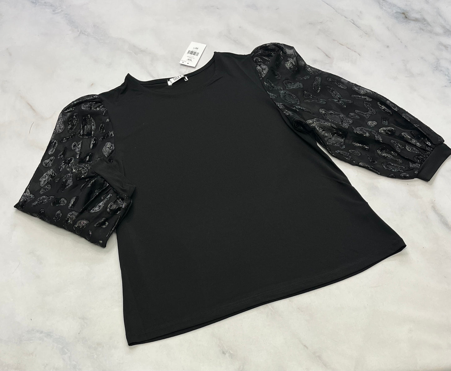 Suzie : Manche ballon qui laisse entrevoir . Manches avec détails en velour brillant. Superbe . Devant noir opaque extensible . M/ fit stretch femme neuf !