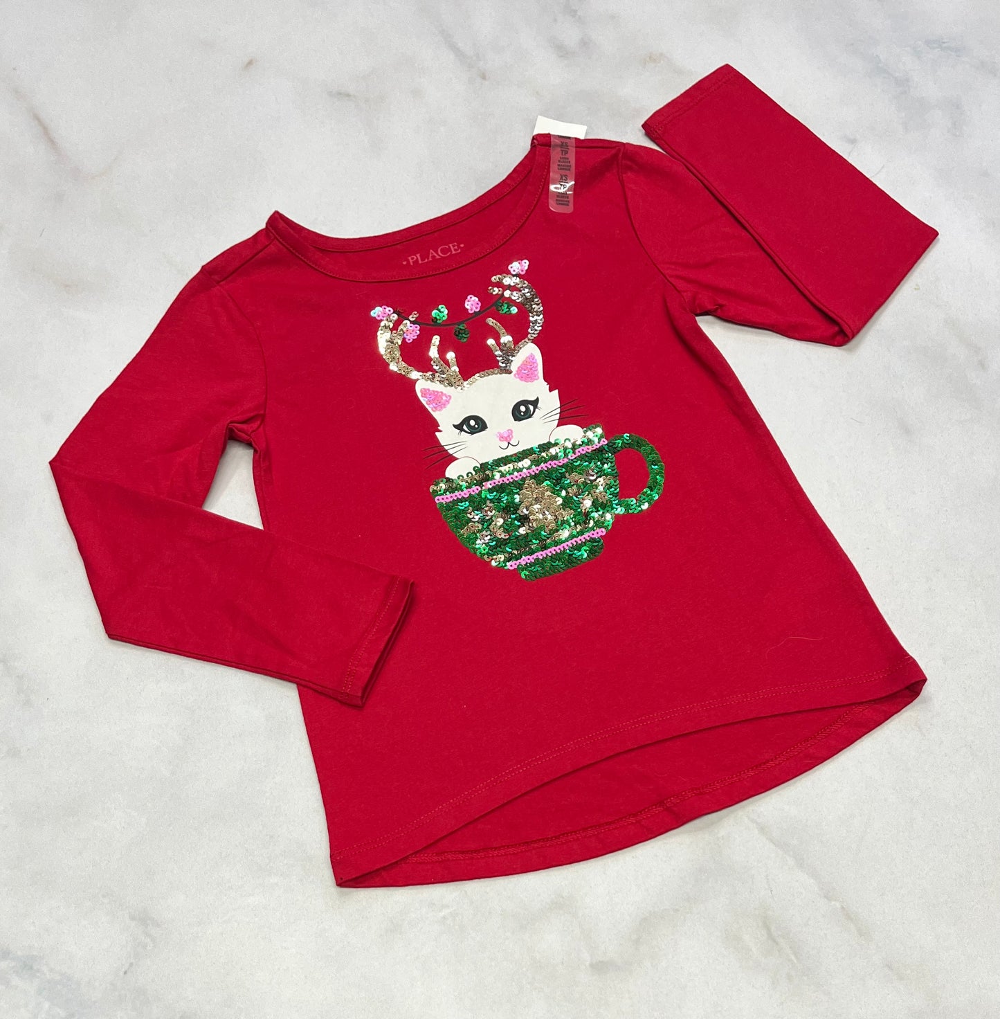 Manche courte brillant neuf ! 4 ans. .