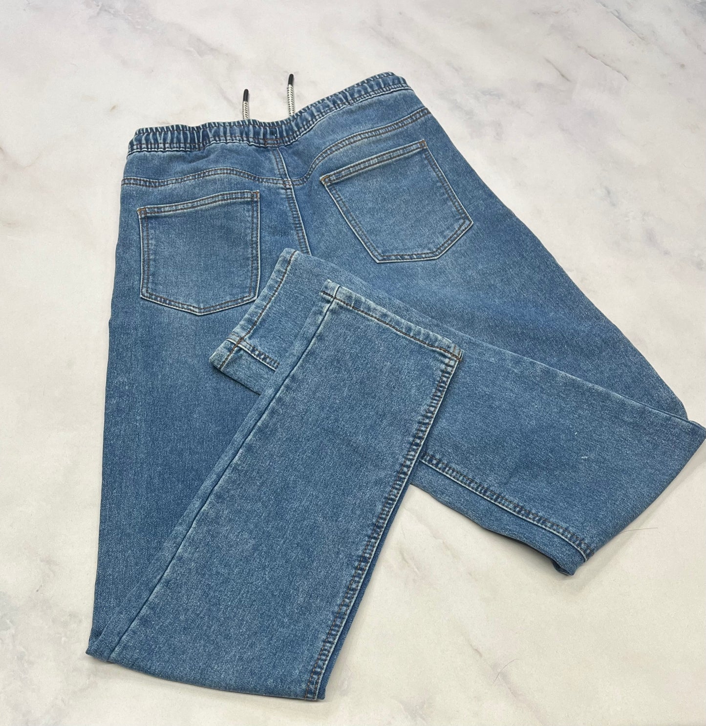 Jeans mou : Surface 16 ans
