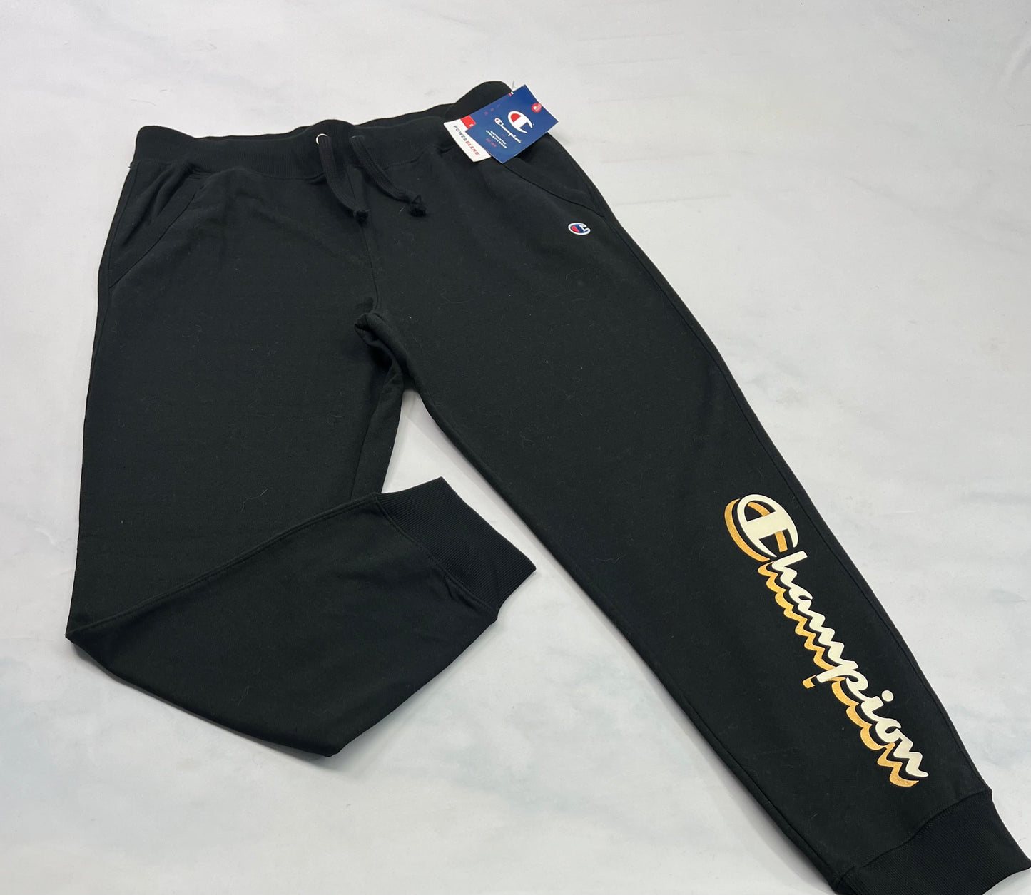 Duo neuf: Large femme . Haut tout doux stretch + Jog champion en ouaté L/ femme .